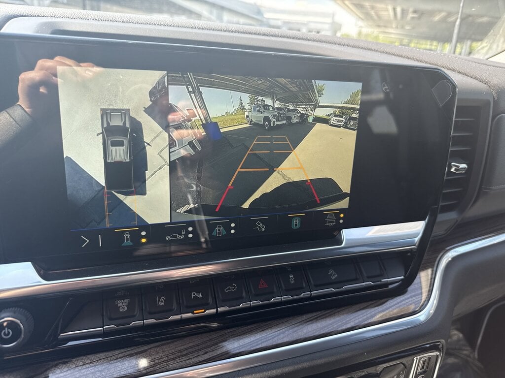 Closeup of the infotainment system of the Silverado 2500HD, showcasing its towing-friendly features