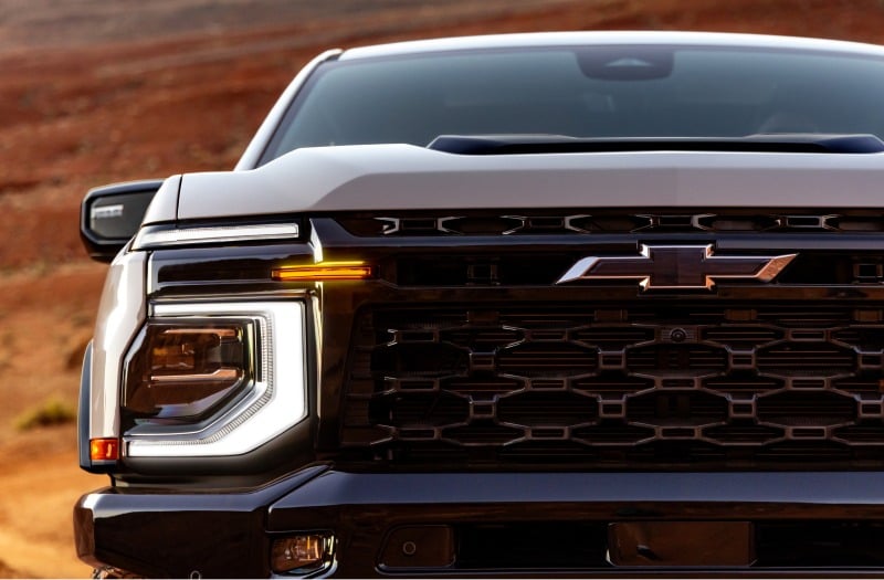 Close-up of the front grille and LED headlight on a 2027 Chevrolet Silverado 1500 ZR2