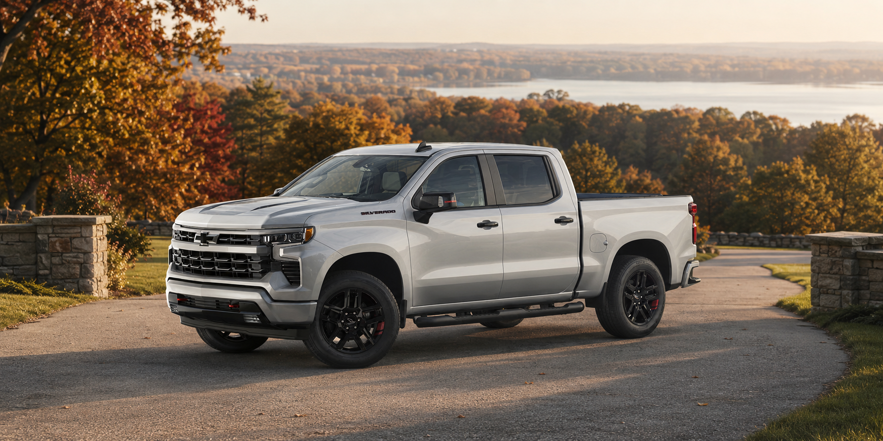 Silver 2026 Chevrolet Silverado 1500 Crew Cab in a warm autumn setting