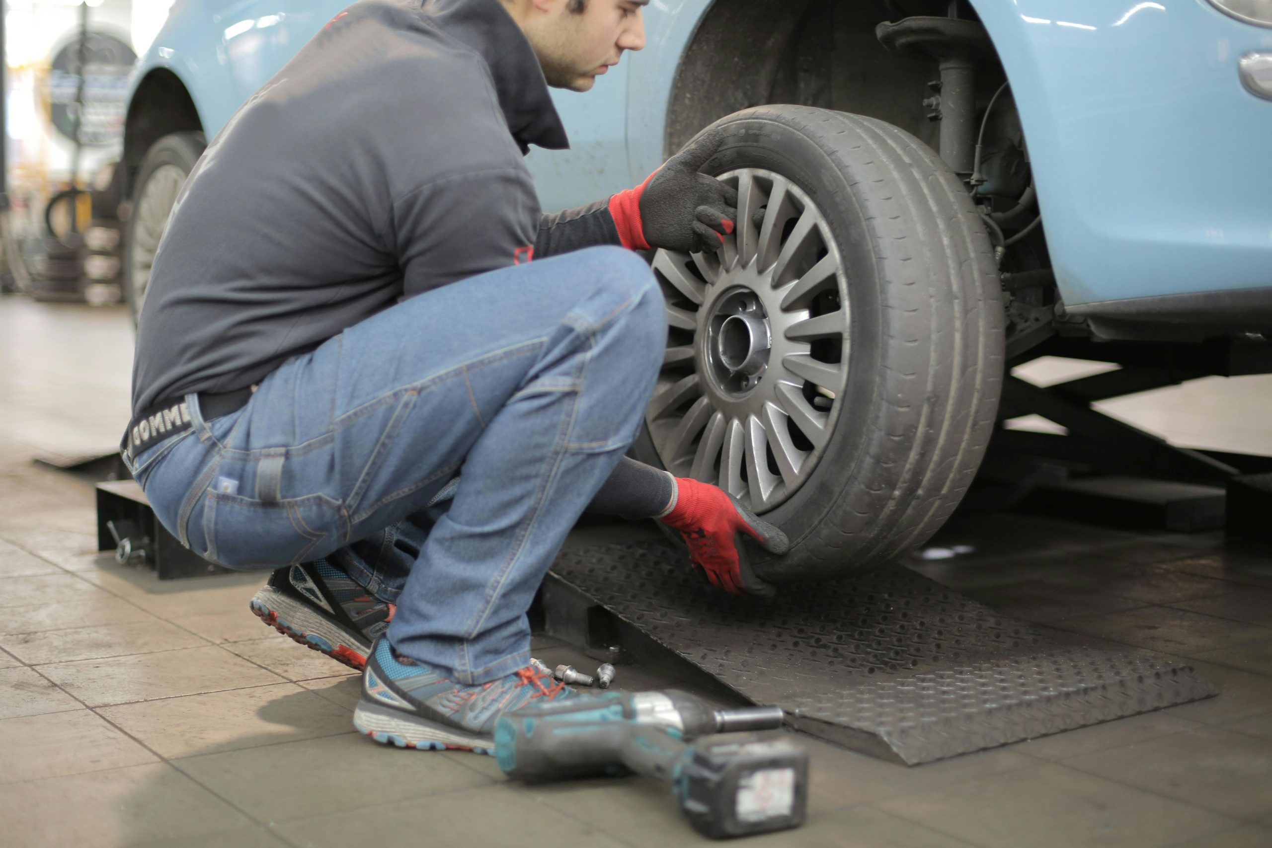 A mechanic changing a tire