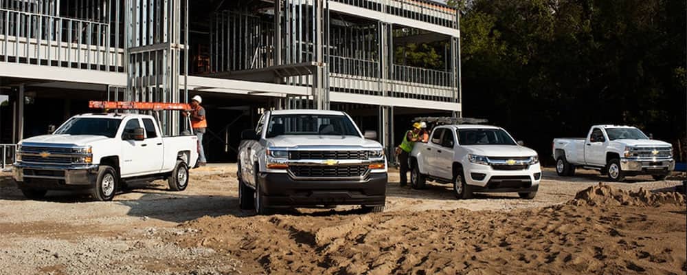 Light duty trucks at a work site