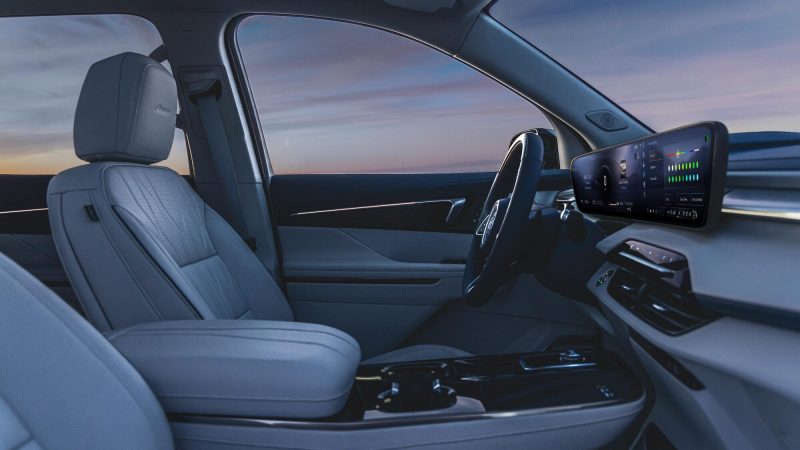 Side view of the front interiors of the 2026 Buick Enclave SUV.