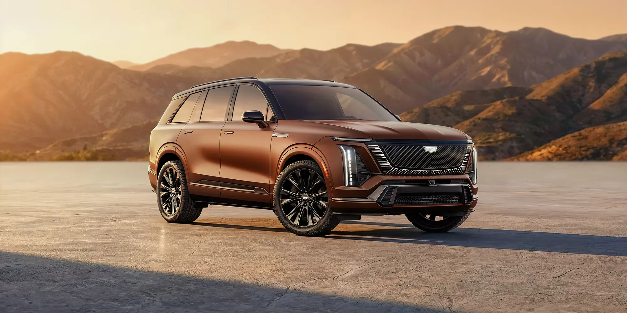 Cadillac Vistiq 2027 électrique devant un paysage montagneux.