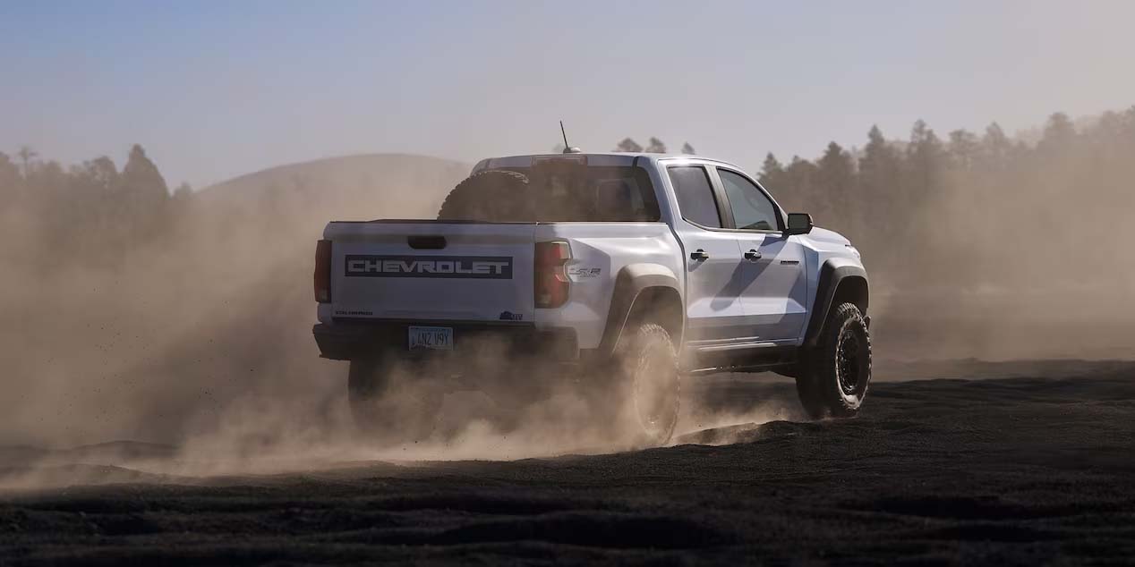 2023 Chevrolet Colorado ZR2 Bison Rear Speeding Through Sand slider_widget-75-1