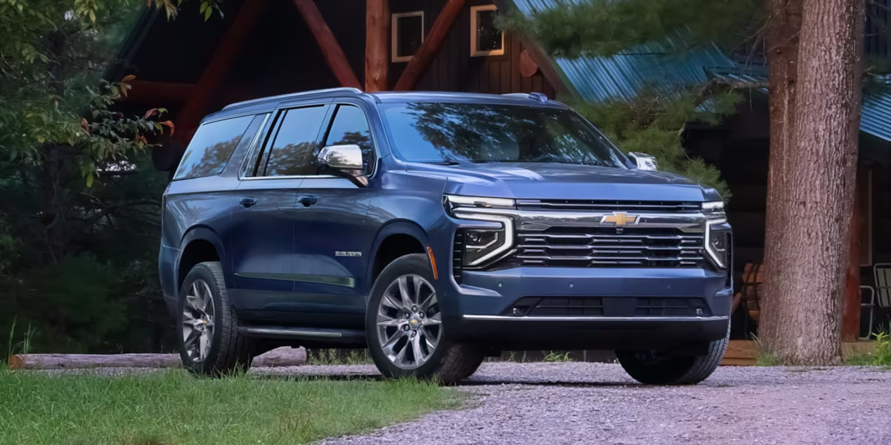 2025 chevrolet suburban blue parked at cabin slider_widget-106-4
